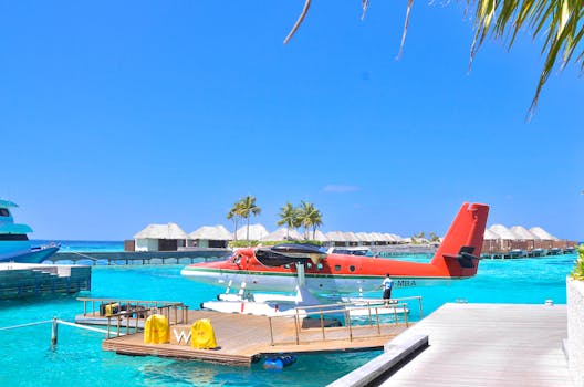 Maldives Villas With Floating Daybeds and Coral Stairs